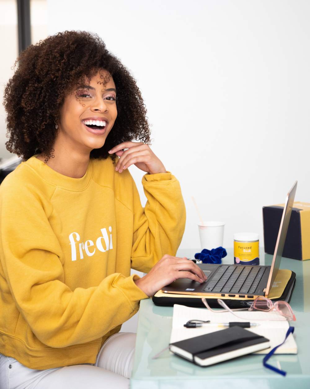 team-fredi-Giofbyn4TTE-unsplash-online-classes-woman-black-mixed-curly-hair-courses-increase-salary-make-more-money