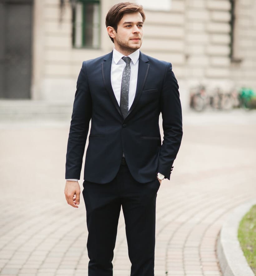 Handsome stylish young businessman posing portrait outdoor FEDERAL GOVERNMENT JOBS MILLENNIALS